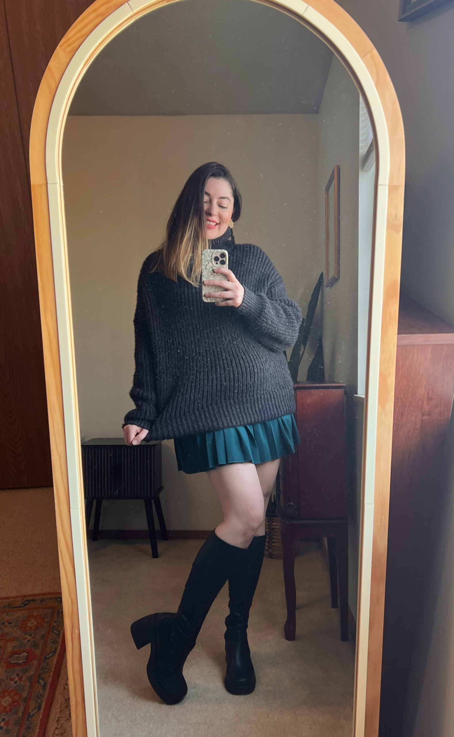 Upgrade Your Tennis Skirt Look with Boots + Oversize Sweater